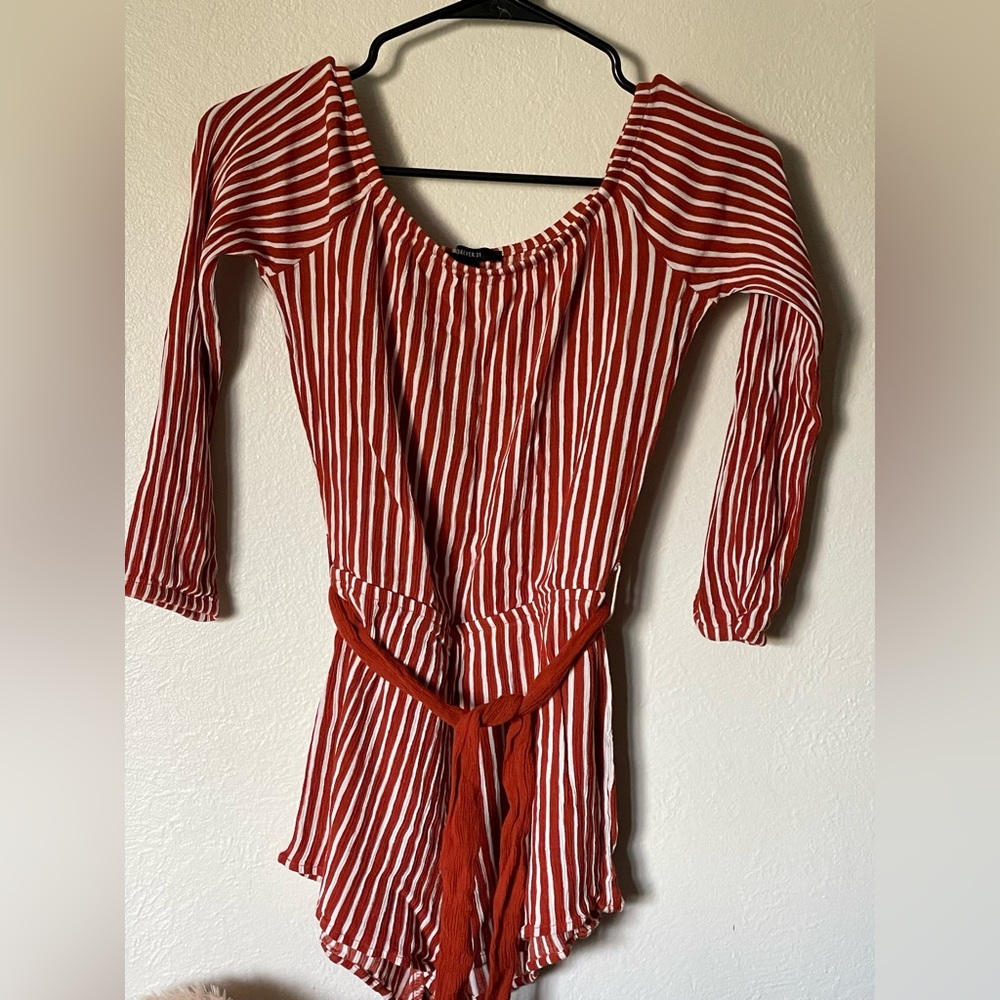 Forever 21 Red and white striped romper with a belt. Lightly use excellent cond